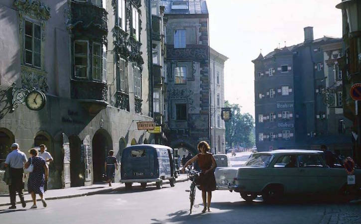 European Street with person walking a bike